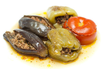 Baked, stuffed peppers, aubergine and tomatoes.