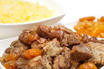 Caucasian traditional pilaf. Rice with meat and fruit