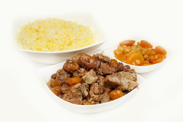 Caucasian traditional pilaf. Rice with meat and fruit