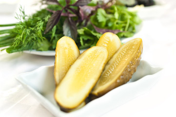 Gherkins on a white background