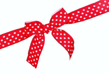 Dotted red ribbon and bow isolated on white background