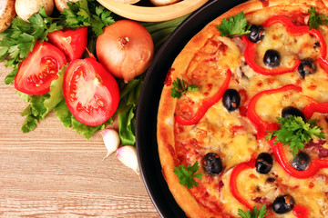 pizza and vegetables on a red background