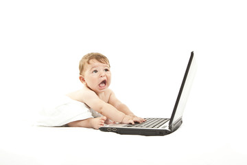 cute little baby using a pc