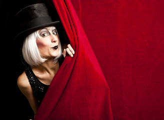 cabaret performer on stage looking at the audience