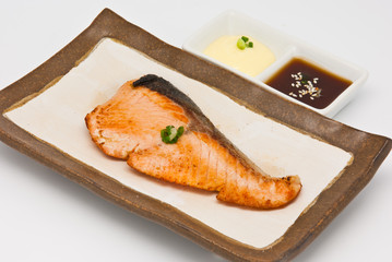 Salmon fish grilled in the plate