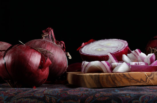 elegant red onion on black background