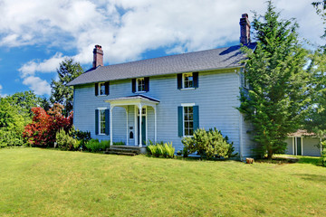 Fototapeta na wymiar Grey classic historical home from 1856 in Washington State.