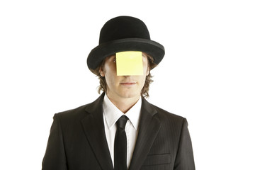 man with blank note on the face with hat