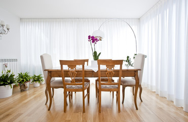 modern dining room with white curtains
