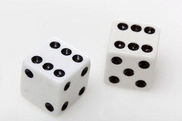 White dice with black dots