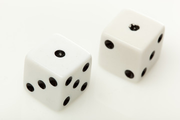 White dice with black dots