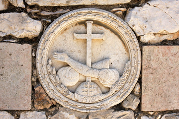 Fototapeta na wymiar Sign on the wall near The Church of All Nations, Jerusalem