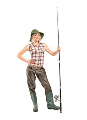 Full length portrait of a blond fisherwoman posing