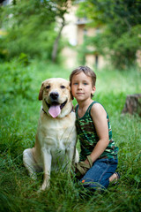 Boy with his dog in the park