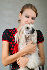 girl and chinese crested dog