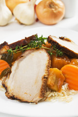 Roasted meat with rice and vegetables