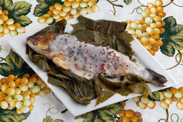 Lubina cocida en vino blanco