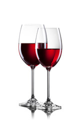 Red wine in glasses isolated on white