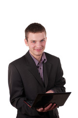 businessman sitting in a jacket with a laptop