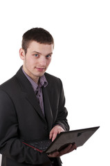 businessman sitting in a jacket with a laptop