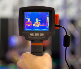 noncontact infrared thermometer in hand
