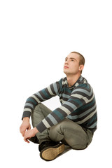 studio picture of a pensive young man, isolated on white