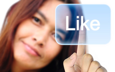 women hand pushing like button on a touch screen interface
