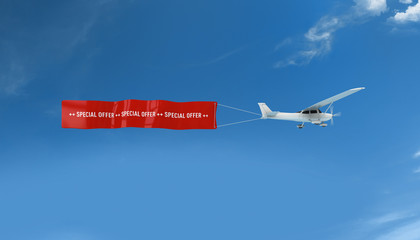 Über den Wolken - Flugzeug mit Banner special offer