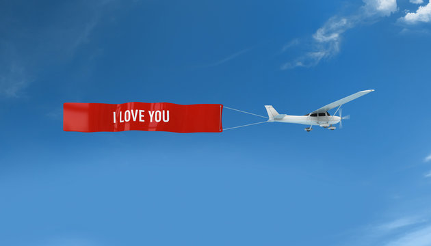 &Uuml;ber den Wolken - Flugzeug mit Banner I love you