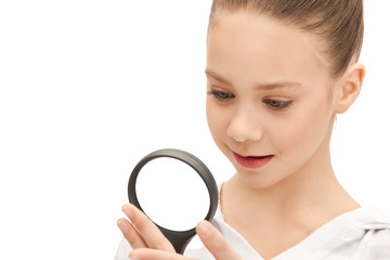 teenage girl with magnifying glass