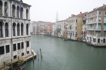 Fototapeta na wymiar Old Rainy Venice Street and Channels