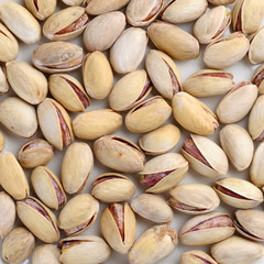 Toasted salted pistachios background