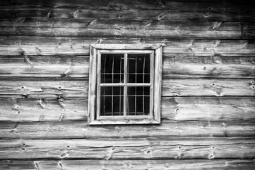 Window in old cottage in retro style