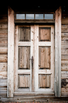 Old door in wooden cottage