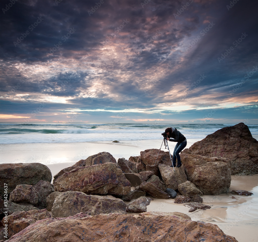 Wall mural photographer by the ocean