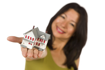 Attractive Multiethnic Woman Holding Small House