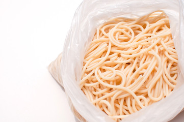 Spaghetti in a bag close up half