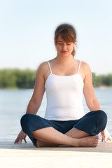 Fototapeta na wymiar Woman doing yoga