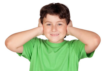 Child holding his hands against his ears