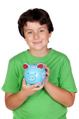 Fototapeta na wymiar Adorable boy with a blue moneybox