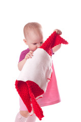 Little girl with wool dress in hands