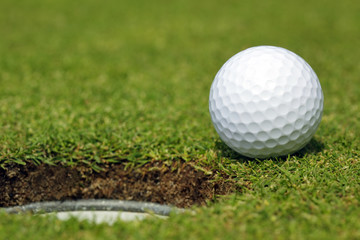 Golfball almost in the hole