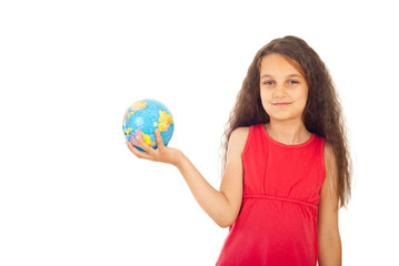 Girl holding small world globe