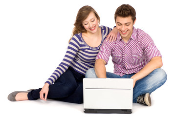 Couple using laptop