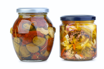 Glass jars with olives and miscellaneous seafood