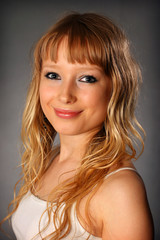 Naklejka premium Blond girl posing in studio