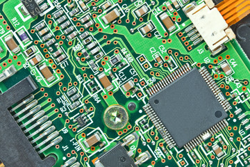 The modern printed-circuit board with electronic components macr
