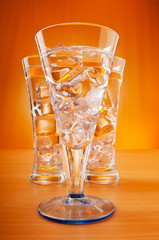 Water in the glass against gradient background