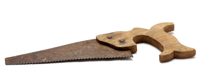 Old rusty toy hand saw on white background