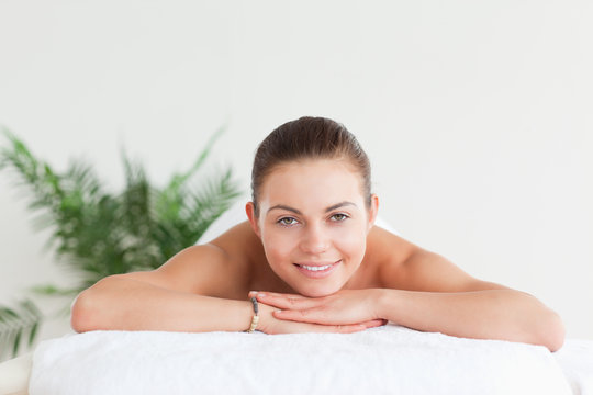 Brunette Lying On A Massage Table